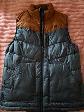 Outdoor Research vest in blue and Tan